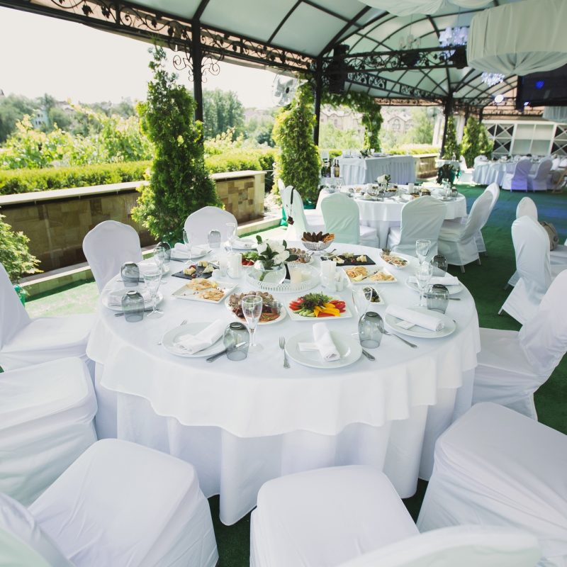 Beautifully decorated tables for guests with decorations